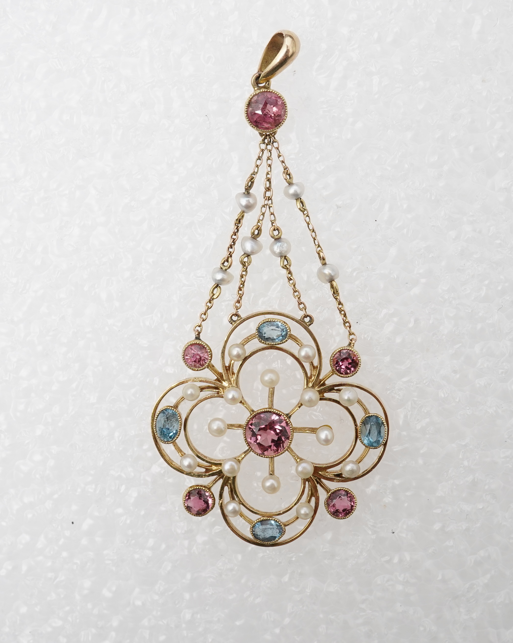 An attractive Edwardian tourmaline and seed pearl pendant, early 20th century